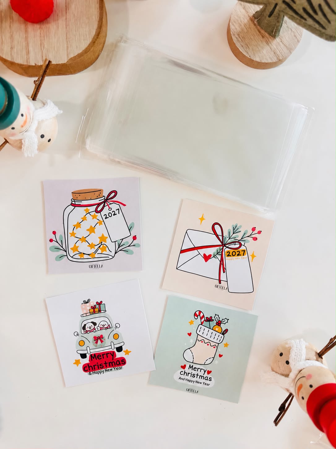 The four card designs in the kit: star jar, envelope, car with dogs, and Christmas stocking