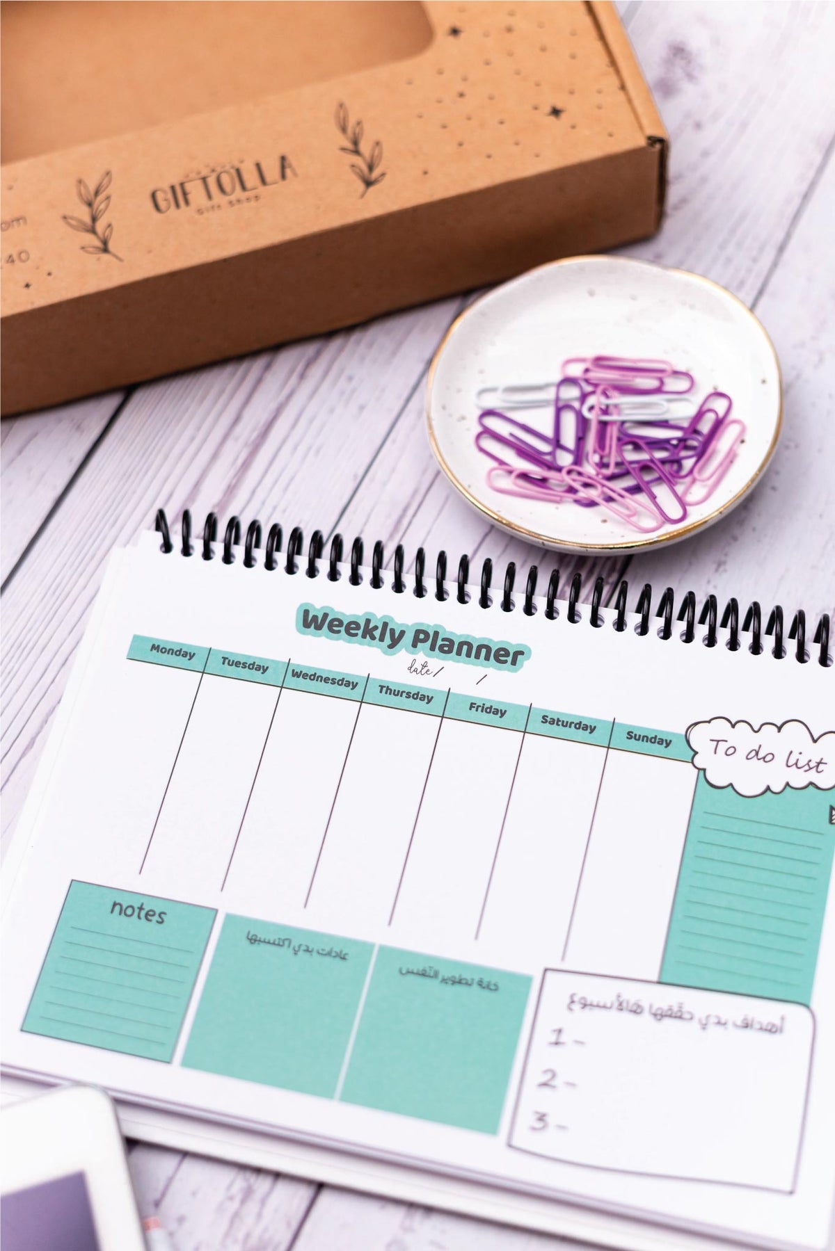 Um Ajqa notebook to commit to your goals and self-development