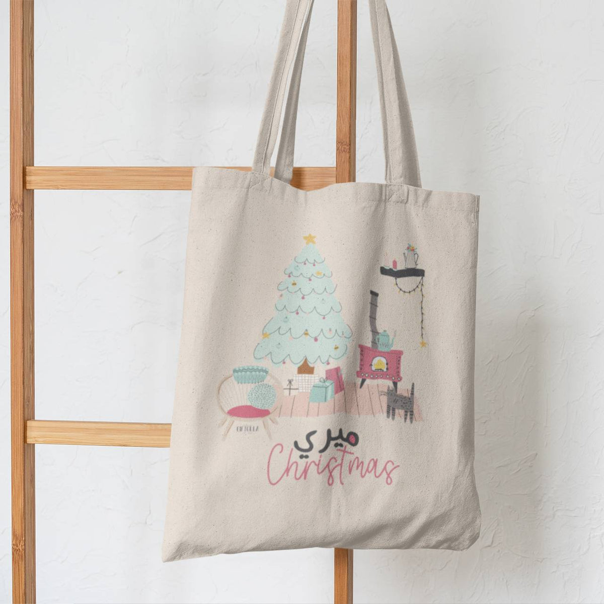 Christmas tote bag hanging from a wooden stair