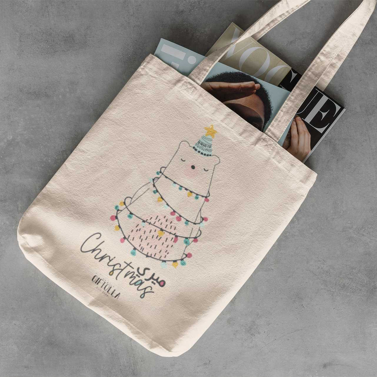 Christmas tote bag placed on a concrete surface