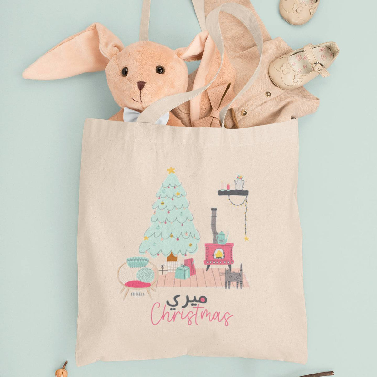 Christmas tote bag filled with baby items